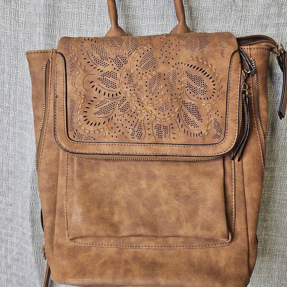 Backpack/ Carry All made from faux leather with a stamped/embossed‎ finish. - Picture 2 of 14